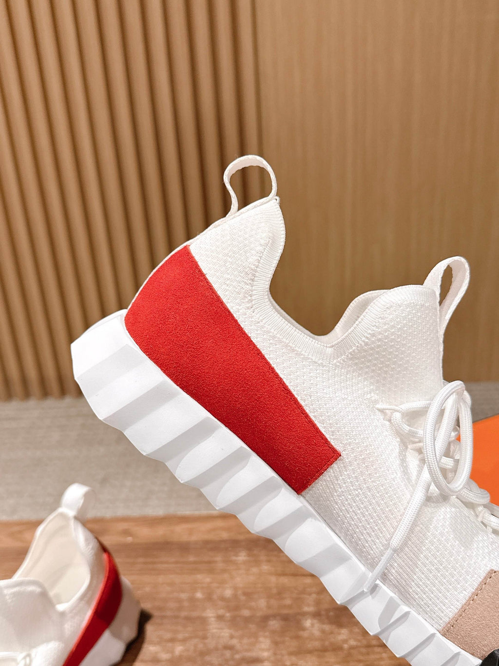 Hermes unisex sneakers, white knit with red stripe, laces and sculpted tread sole