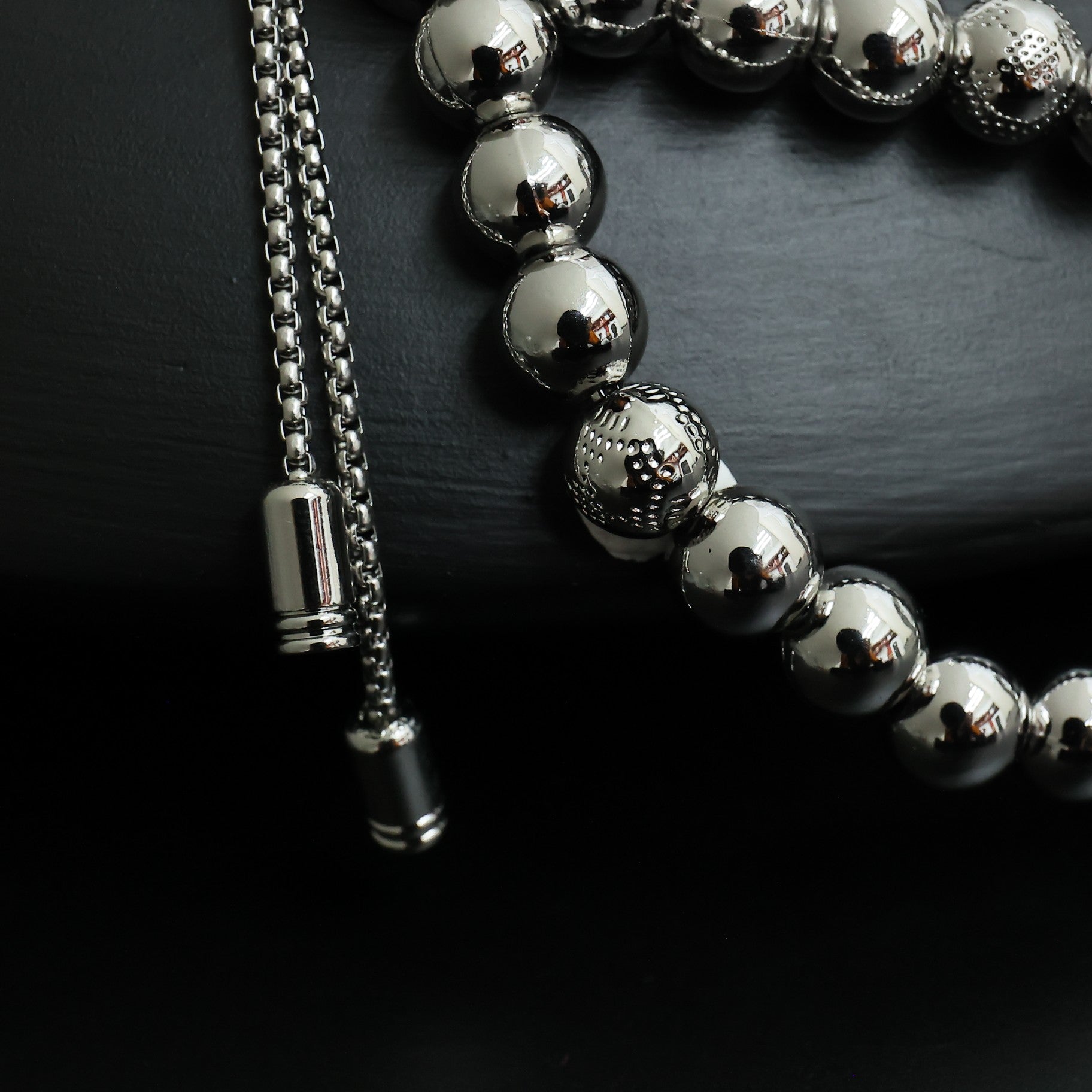 Louis Vuitton beaded necklace strand with round silver beads and chain tassel end caps