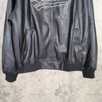 Dark leather zip-up jacket with two front pockets and elastic cuffs