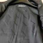 Balenciaga long jacket lining with repeating Balenciaga logo print