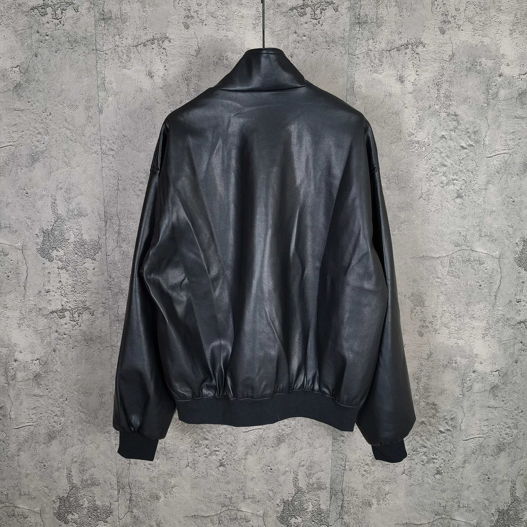 Balenciaga dark leather zip bomber jacket with ribbed hem and cuffs, back view