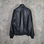 Balenciaga dark leather zip bomber jacket with ribbed hem and cuffs, back view