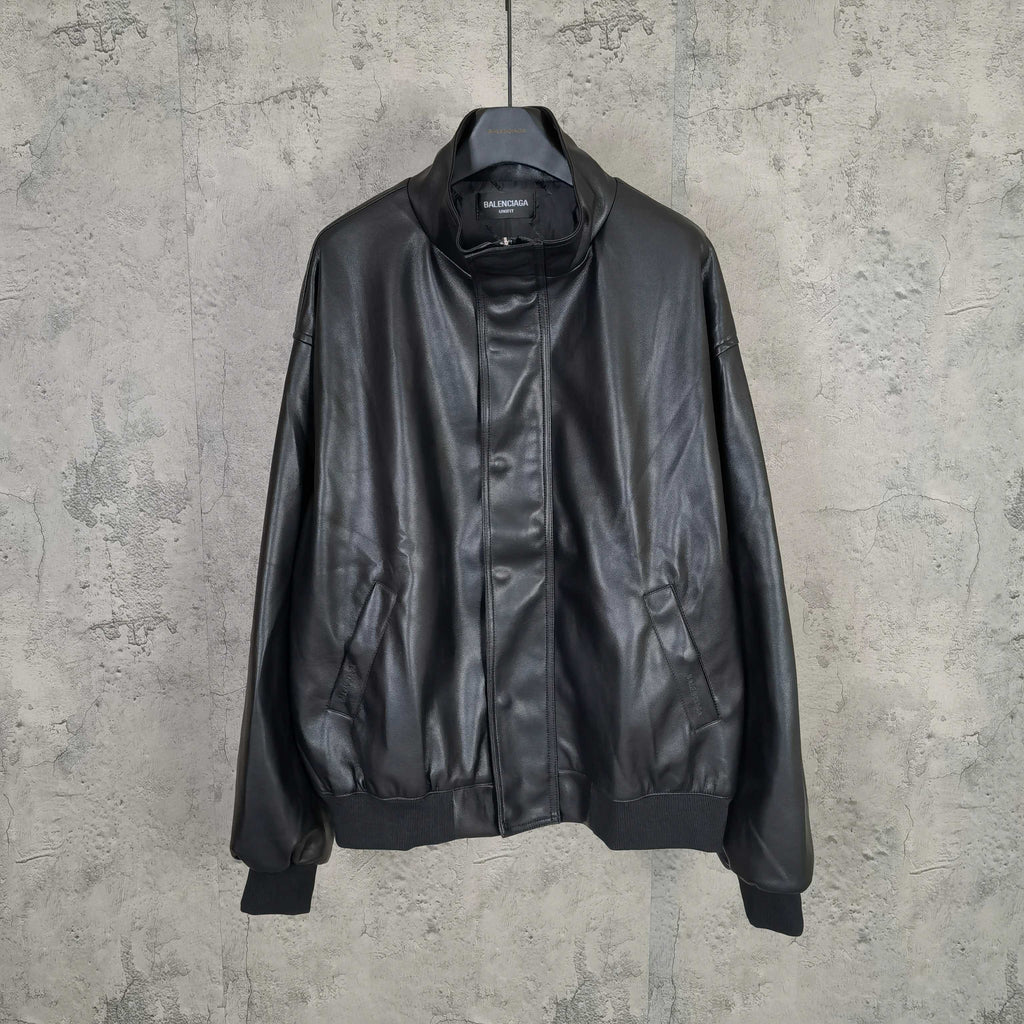 Balenciaga dark leather zip jacket with stand collar, ribbed cuffs, and front pockets
