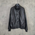 Balenciaga dark leather zip jacket with stand collar, ribbed cuffs, and front pockets