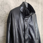 Balenciaga dark leather jacket with raised collar and zip front, side view