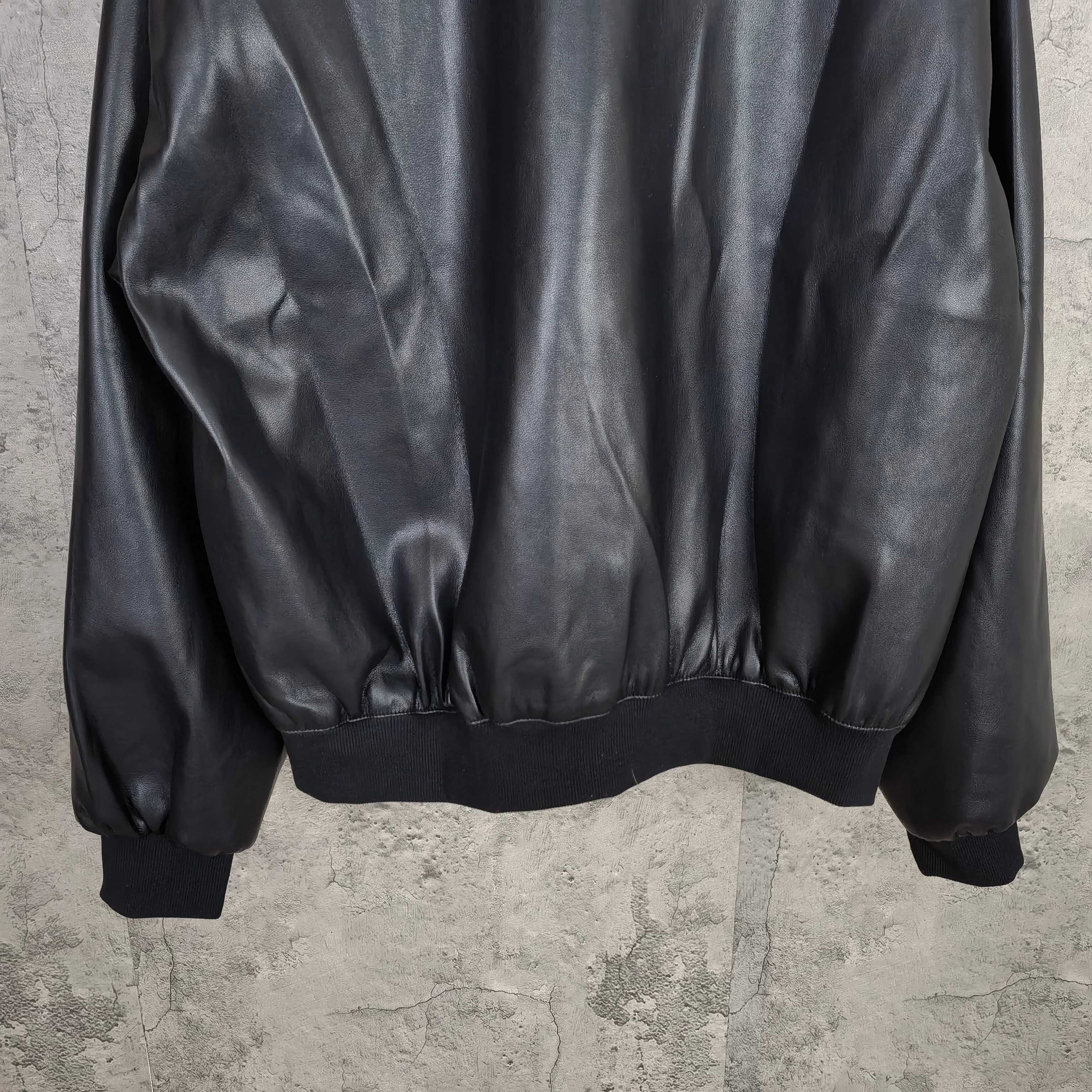 Balenciaga long leather jacket with ribbed hem and elastic cuffs