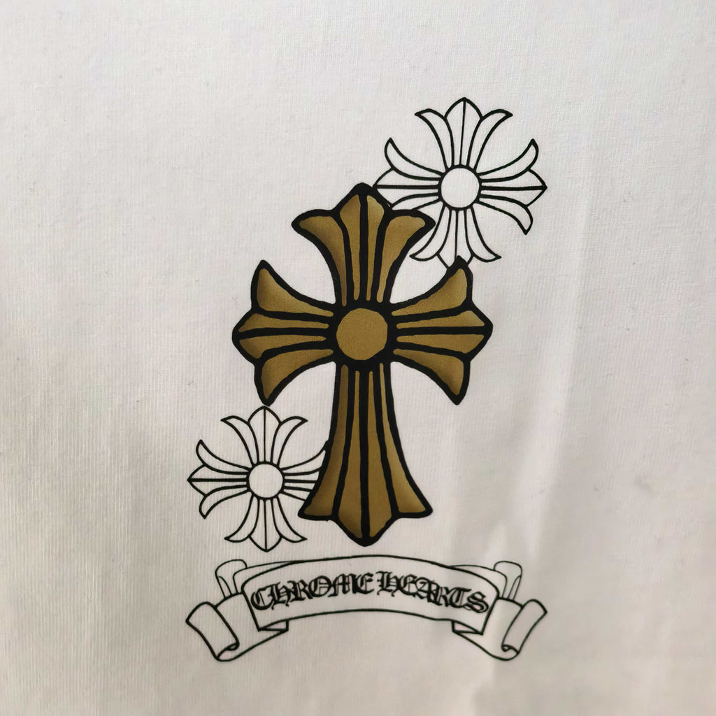 Cross and flower emblem graphic on white long-sleeve T-shirt
