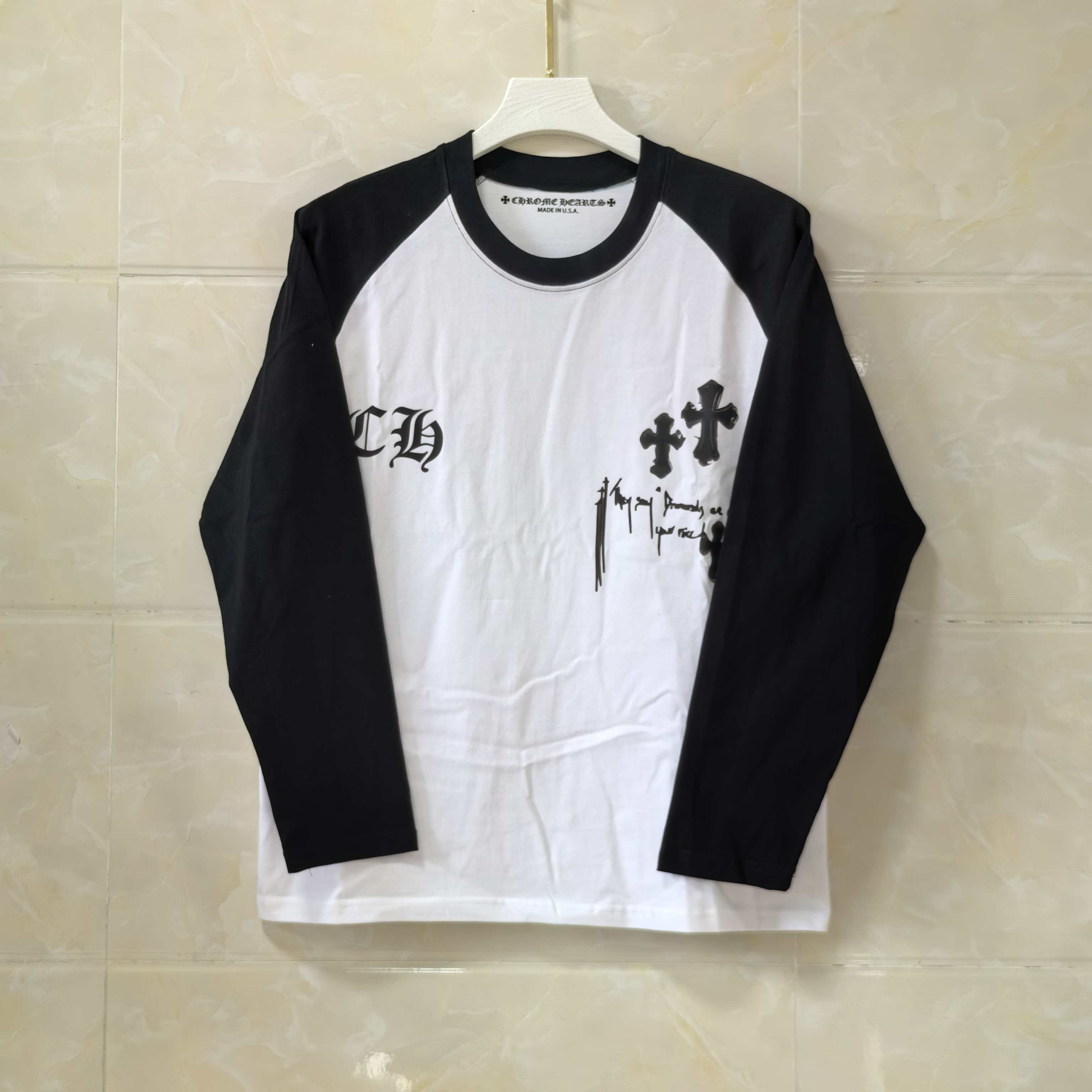 Raglan long-sleeve T-shirt, black sleeves and black accents, white body with gothic cross print