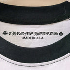Inside neck label on black-and-white raglan shirt: chrome hearts and Made in U.S.A.