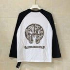 Chrome long-sleeve raglan shirt, white front with black sleeves and chest graphic