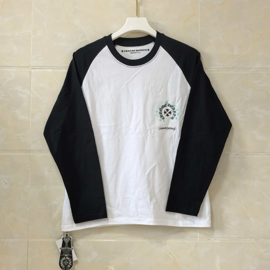 Long-sleeve raglan shirt with black sleeves, white body, small chest logo print