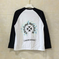 Long-sleeve raglan shirt with black sleeves and white body, front graphic print
