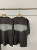 Black short-sleeve T-shirt with crew neck and centered logo graphic