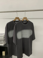 Black short-sleeve T-shirt with crew neck and chest logo graphic