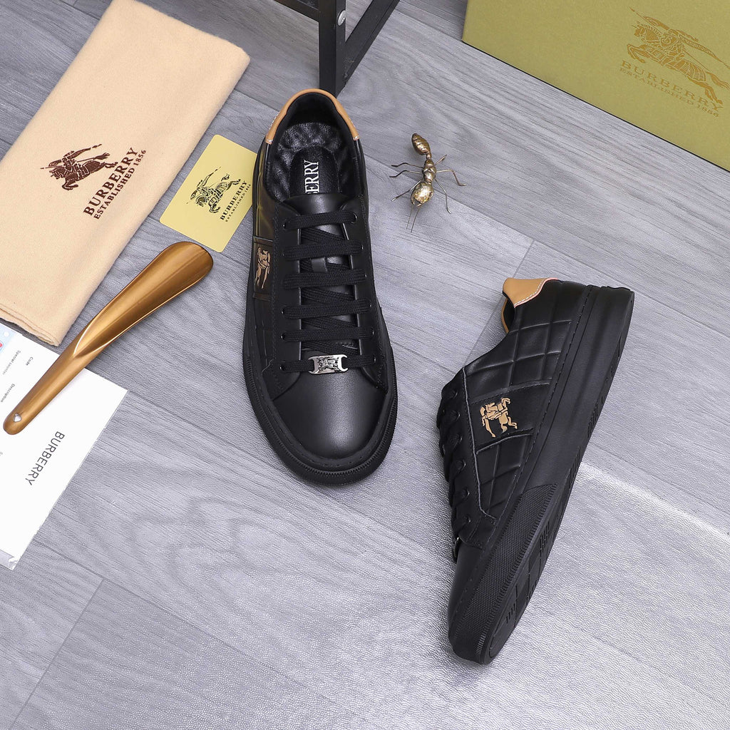 Black Burberry lace-up sneakers with horse logo on the tongue and side emblem.