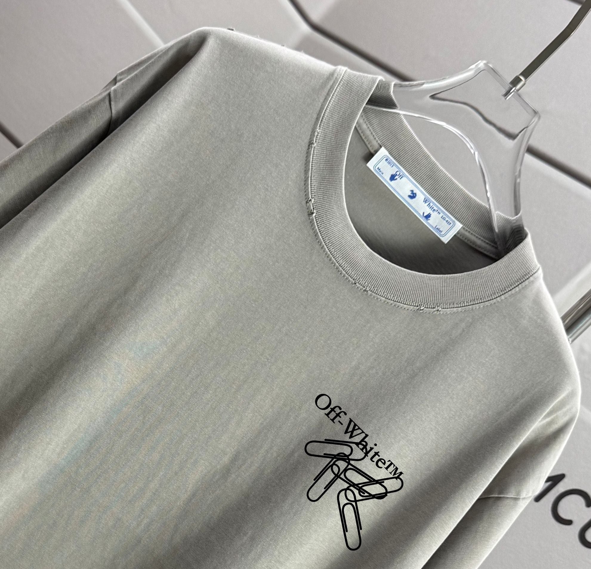 Off-White T-shirt close-up, off-white crew neck and chest logo print
