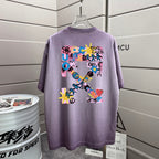 Off White lavender T-shirt with large multicolor back graphic, short sleeves, crew neck