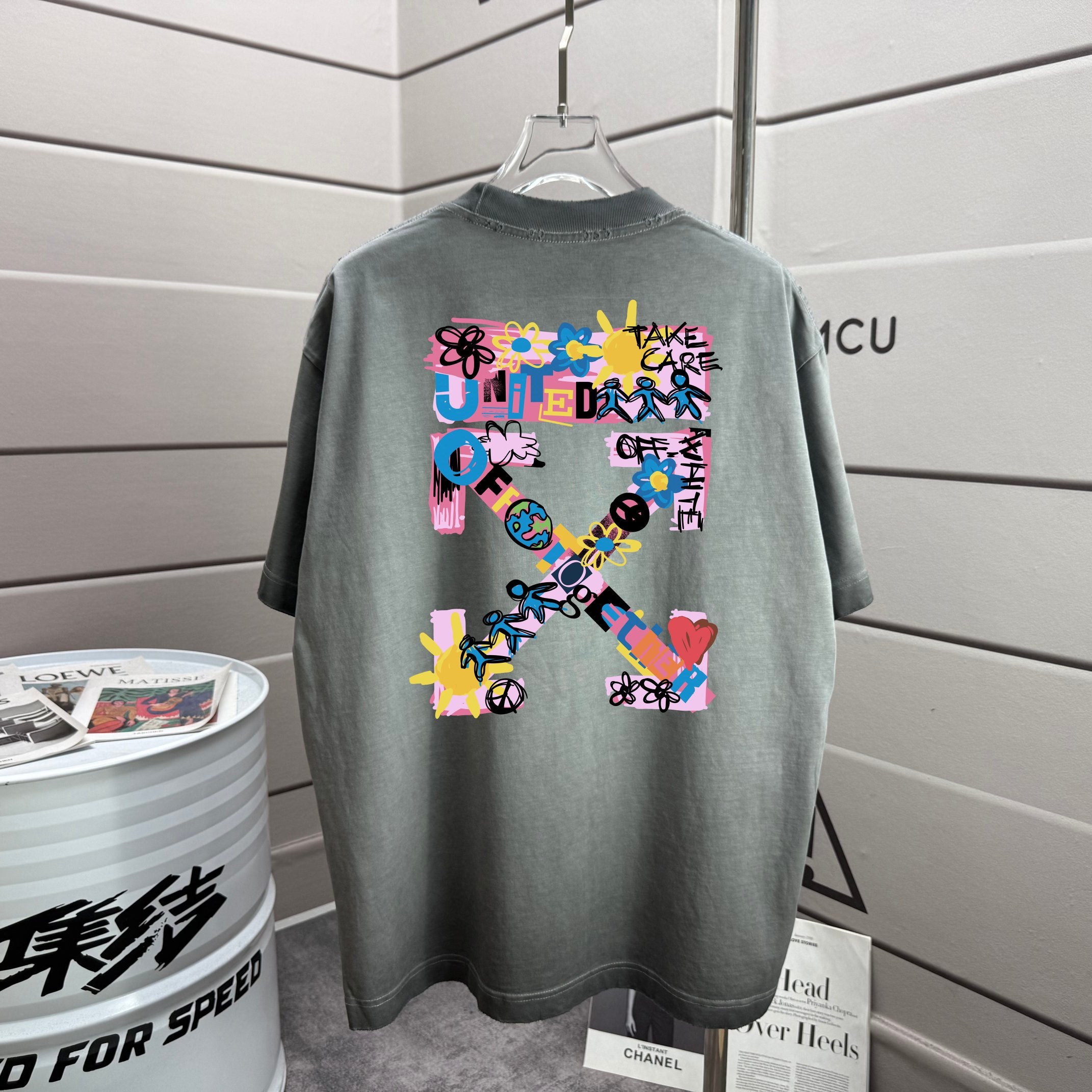 Short-sleeve T-shirt in dark gray with colorful graphic print on the back