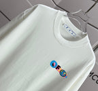 Off-white T-shirt showing crew neck and small chest logo graphic