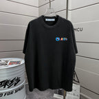 Off White black T-shirt with small colorful logo graphic on the front