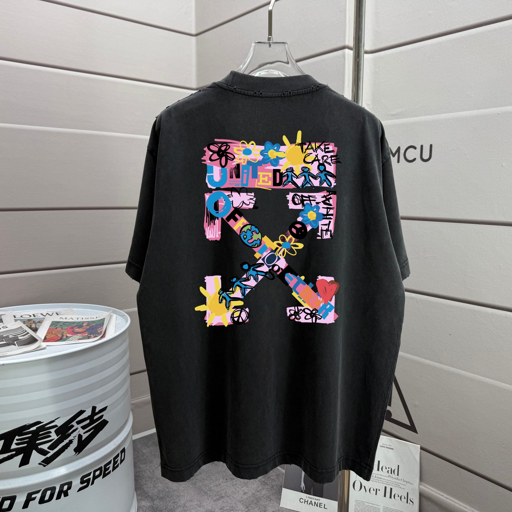 Off White black T-shirt with large colorful graphic on the back