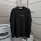 Black T-shirt with small chest logo graphic