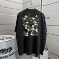 Black T-shirt with large back floral print design