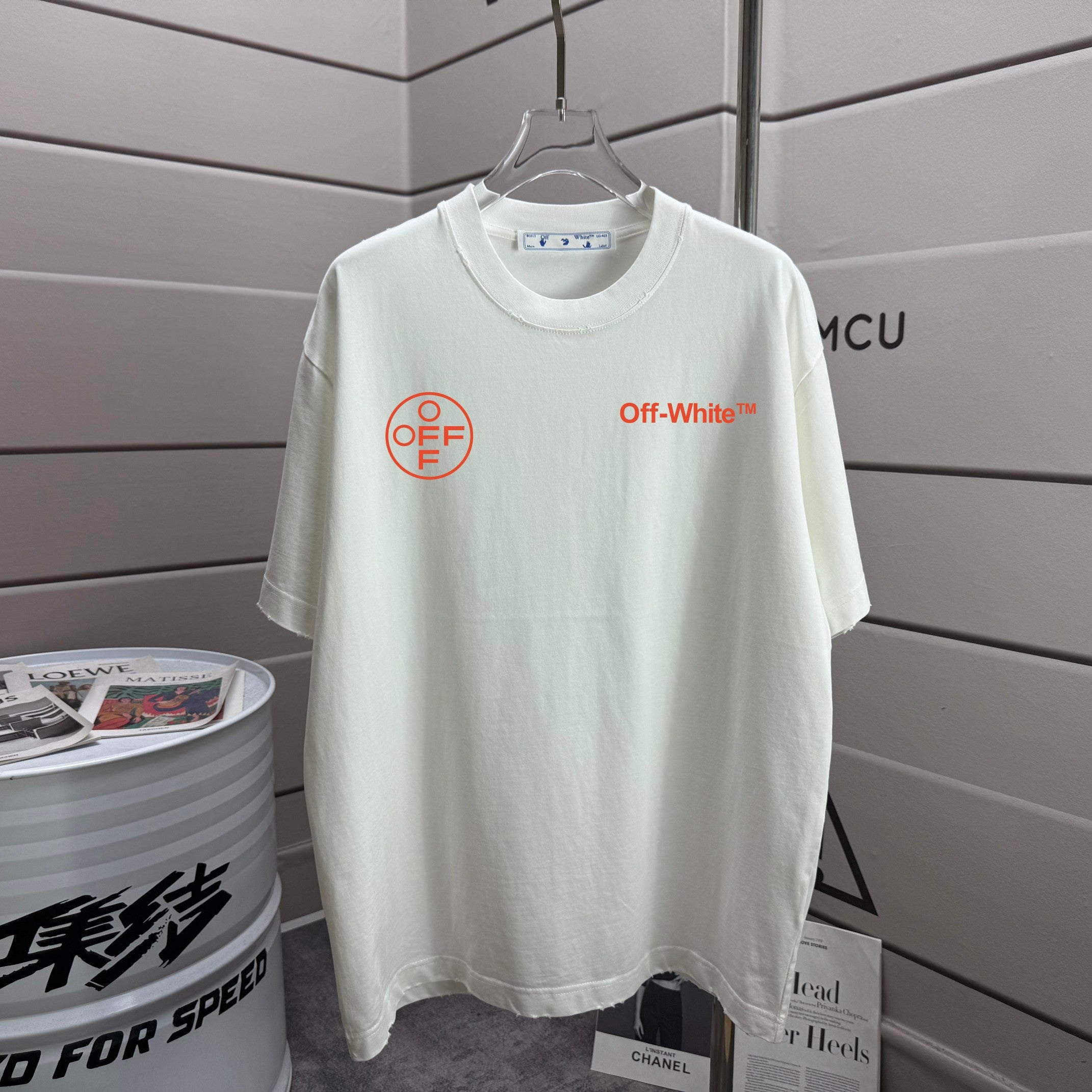 Off-White front T-shirt in off-white with Off-White logo text and red circle emblem