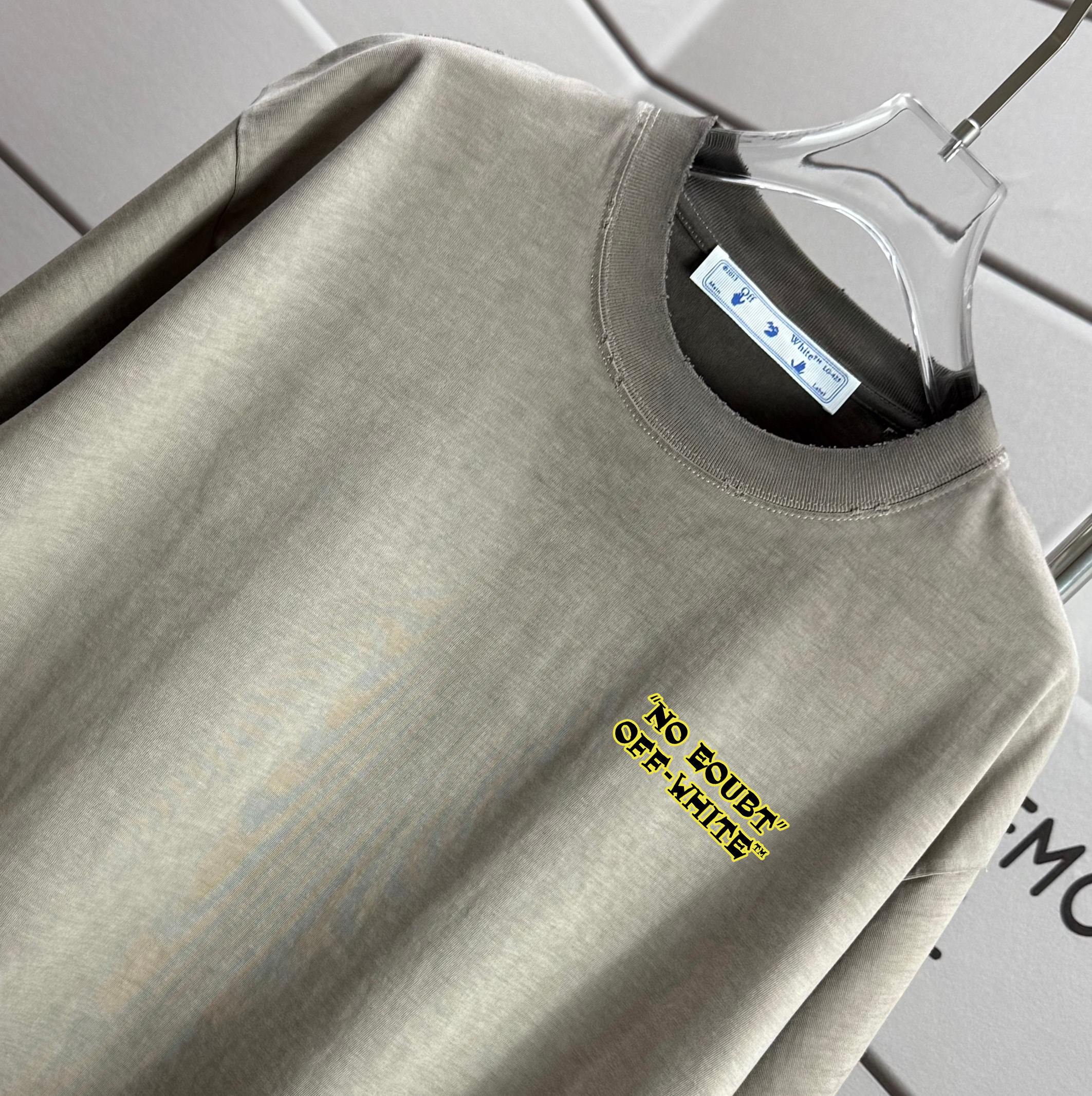 Graphic T-shirt close-up of crew neck and small chest print