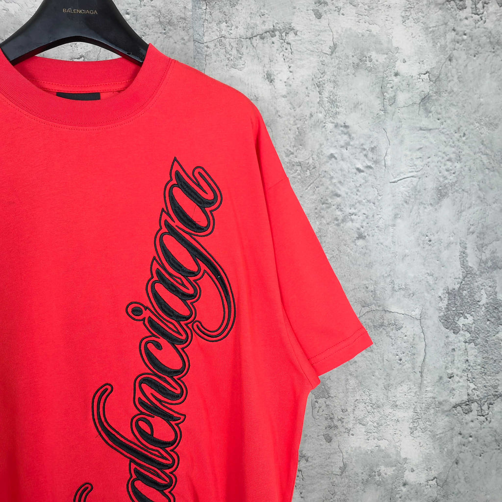 Balenciaga red short-sleeve T-shirt with black script logo and crew neckline