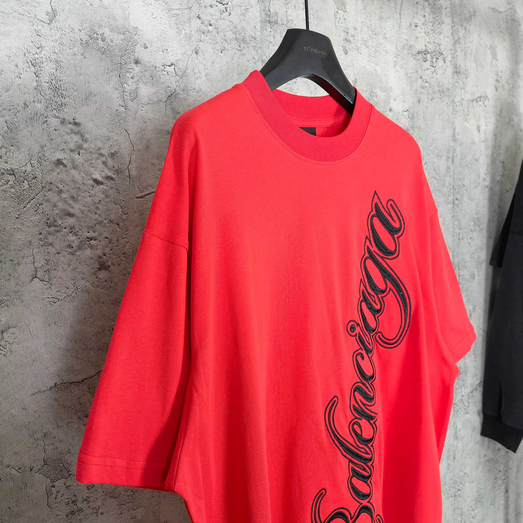 Balenciaga red short-sleeve T-shirt with black script logo on front