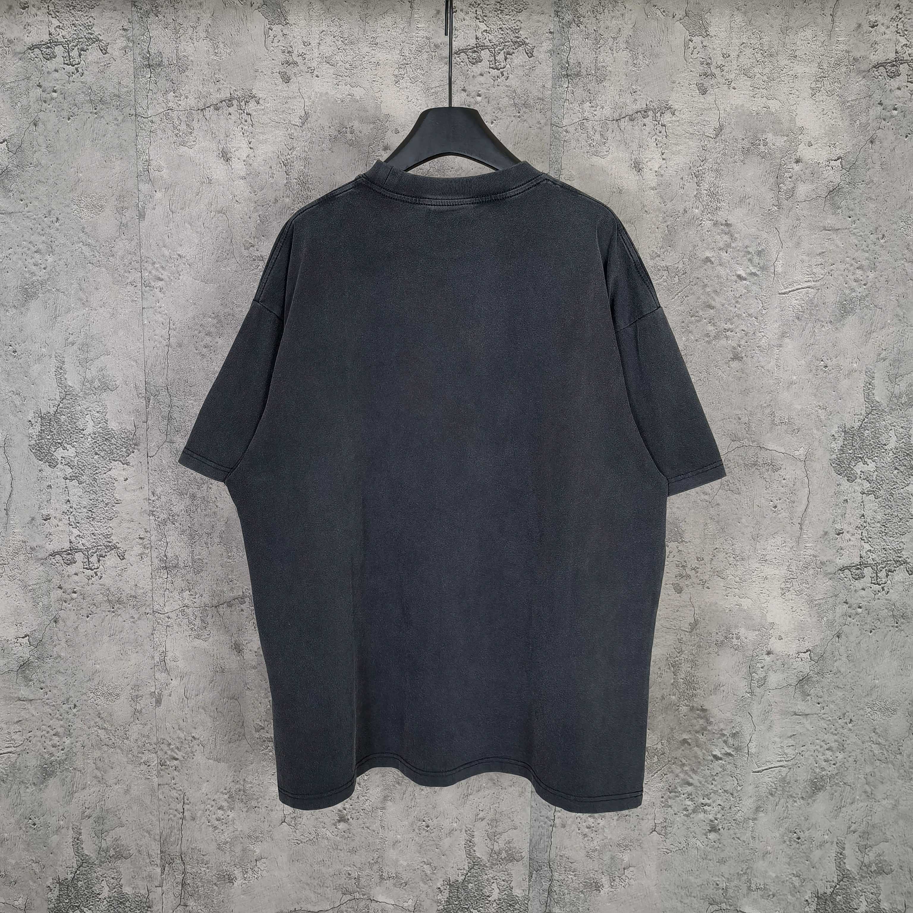 Dark wash crewneck T-shirt, back view with short sleeves and relaxed fit