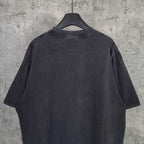 Dark wash crewneck T-shirt, back view with short sleeves and straight hem