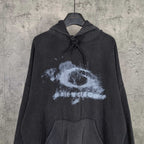 Balenciaga long-sleeve hoodie, dark with distressed logo graphic, hood and drawstring