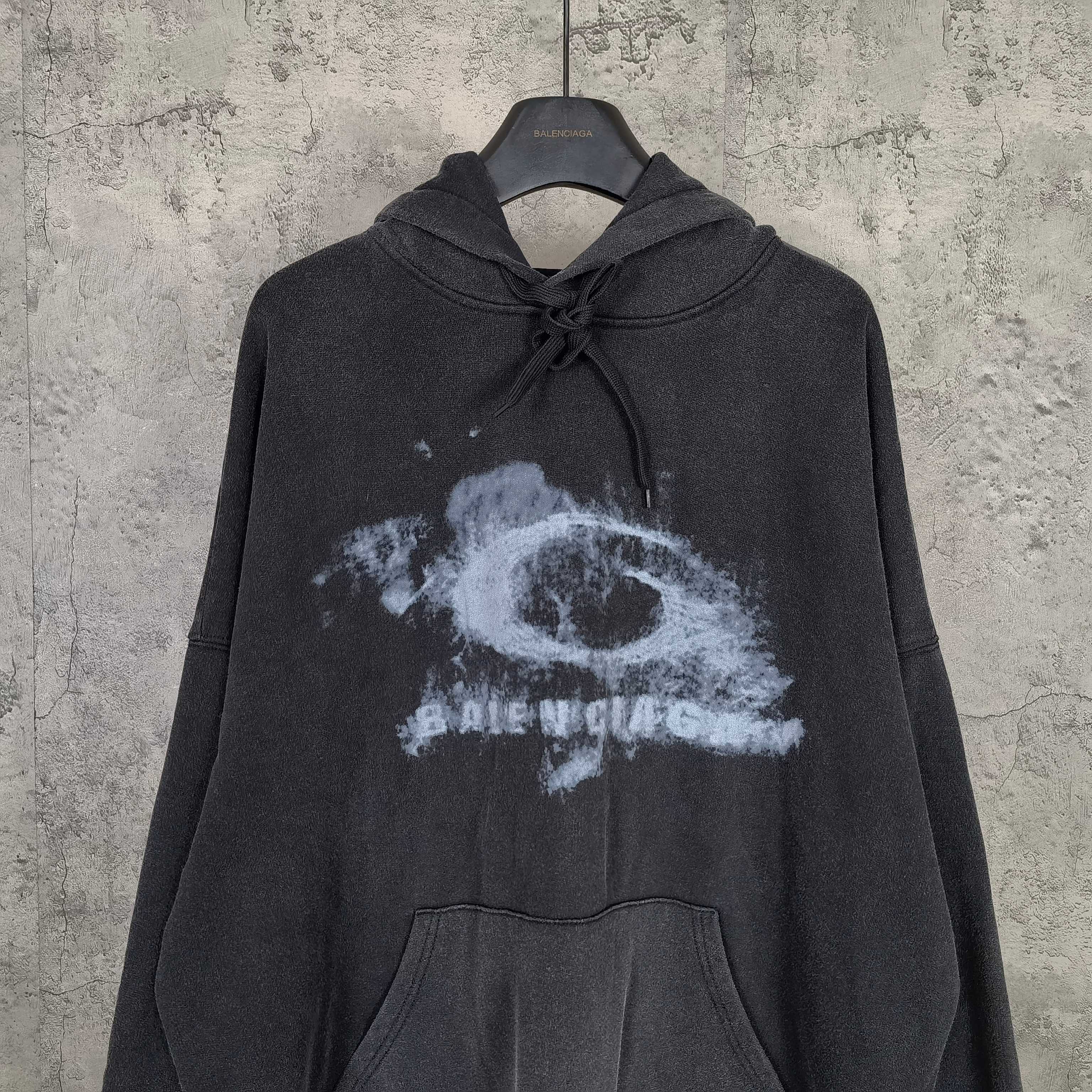 Balenciaga long-sleeve hoodie, dark with distressed logo graphic, hood and drawstring