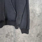 Balenciaga hoodie sleeve and hem detail in dark fabric with ribbed cuff