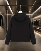 Burberry long zip-up hooded jacket, rear view with hood and center zipper
