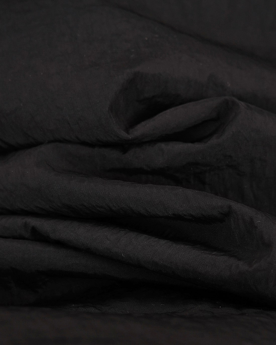 Burberry jacket fabric close-up, dark woven texture