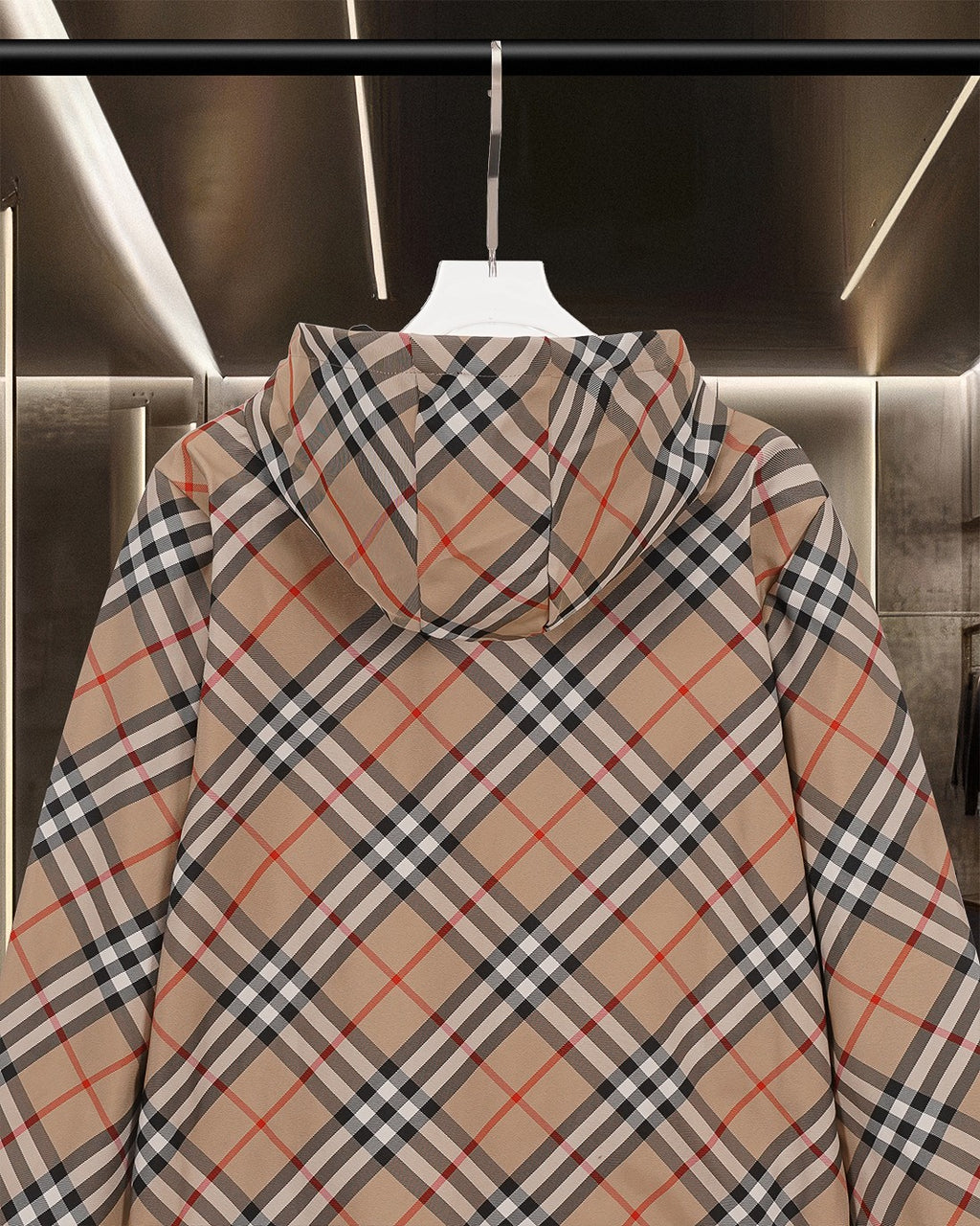 Long hooded plaid jacket back view with draped hood and front zip closure