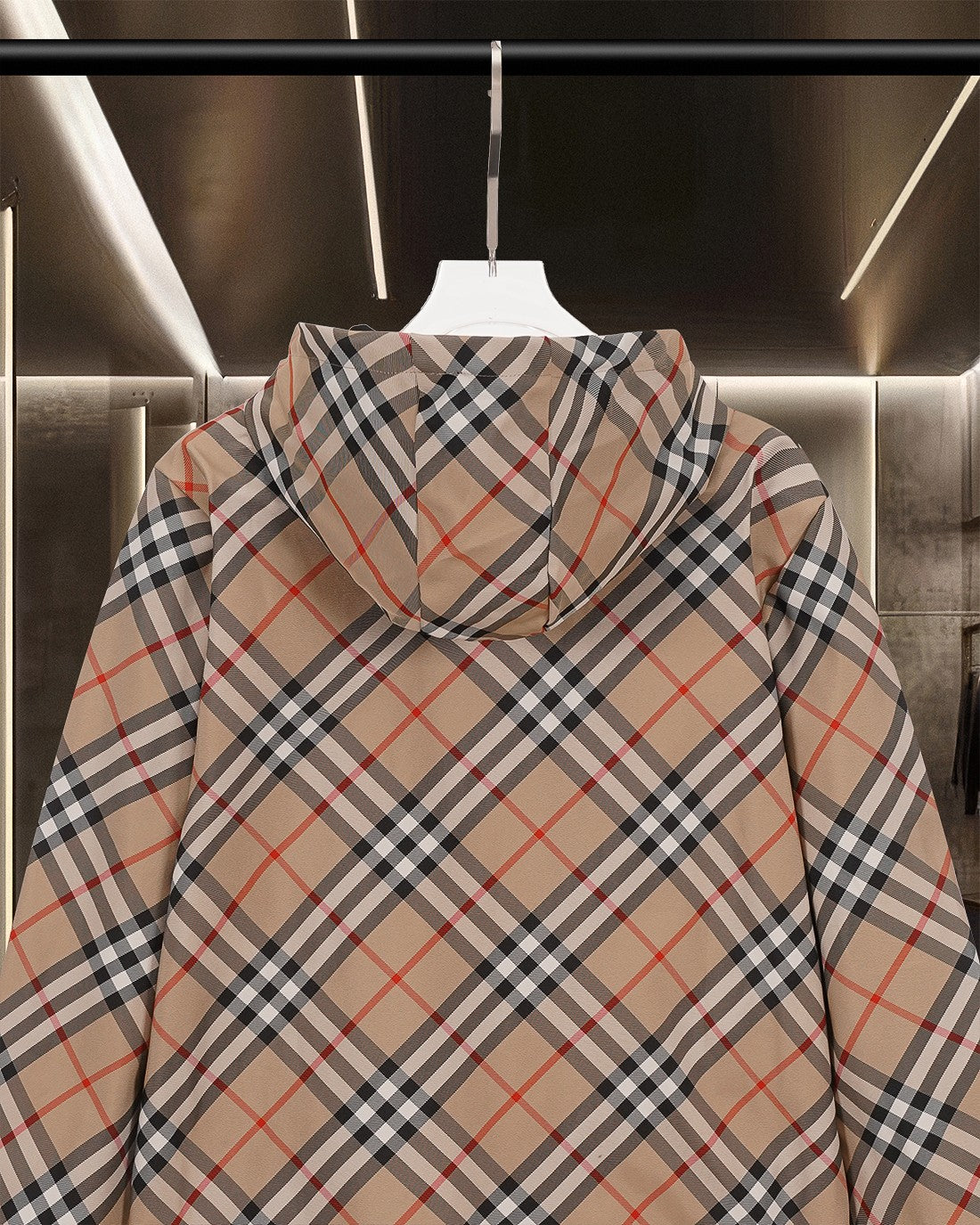 Long hooded plaid jacket back view with draped hood and front zip closure
