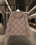 Long hooded jacket back view in beige, black, and red plaid with front zip