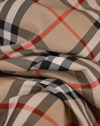 Burberry plaid coat fabric in beige weave with black, white and red check