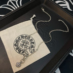 Silver-tone chain necklace with snowflake pendant and dangling charm on display set