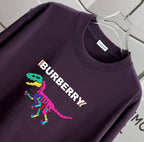 Dark purple Burberry T-shirt closeup with colorful logo graphic on chest