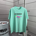 Mint green Burberry T-shirt with crew neck and colorful graphic logo print