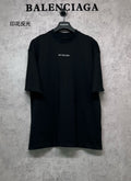 Black crewneck T-shirt with small BALENCIAGA logo on chest