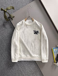 Crewneck sweatshirt with marbled light design and black DiR logo, long sleeves