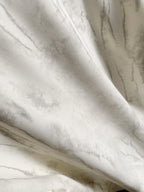 Marbled light fabric detail on a crewneck sweatshirt