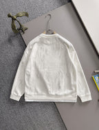 Crewneck sweatshirt front with marbled light fabric and black DiR logo