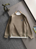 Beige long-sleeve crewneck sweatshirt with small Fendi logo on chest
